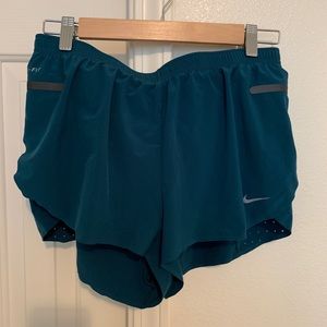 Nike teal running shorts